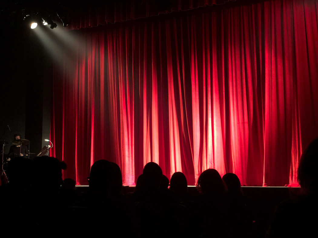 Curtain call, stage for performing arts. 