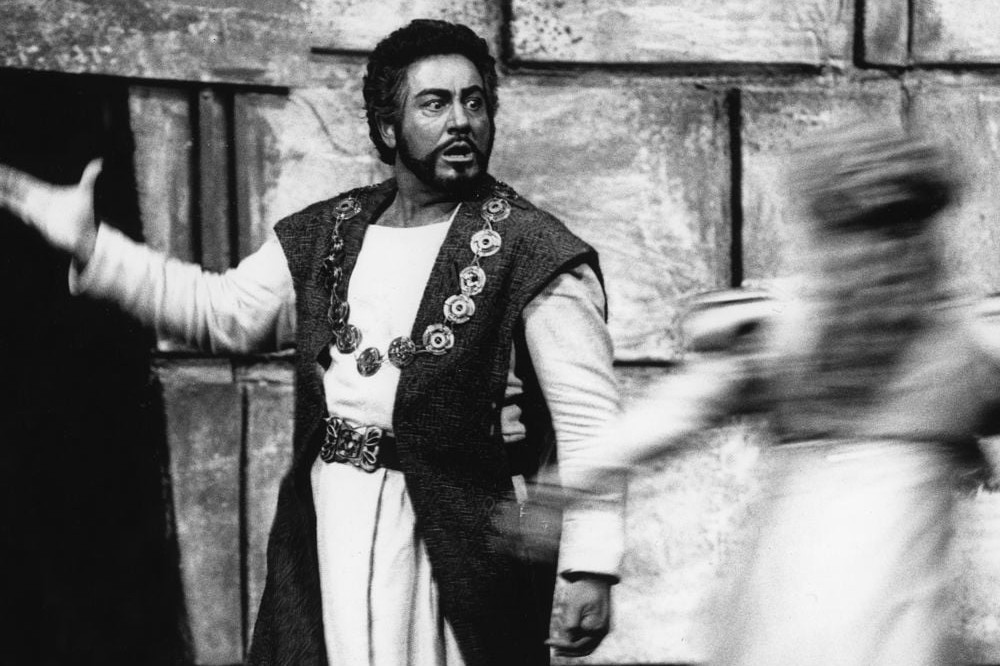 An actor as Othello in a scene from Shakespeare's opera "Othello". Black/white image photo. 